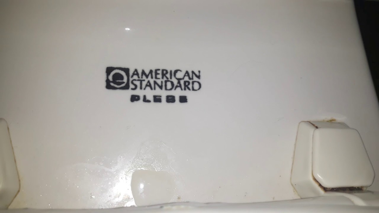 964 1982 American standard plebe toilet on overfilled tank. YouTube
