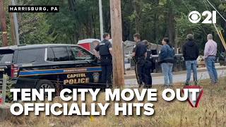 Tent City: Police presence around unhoused encampment as move out deadline hits, residents vacate