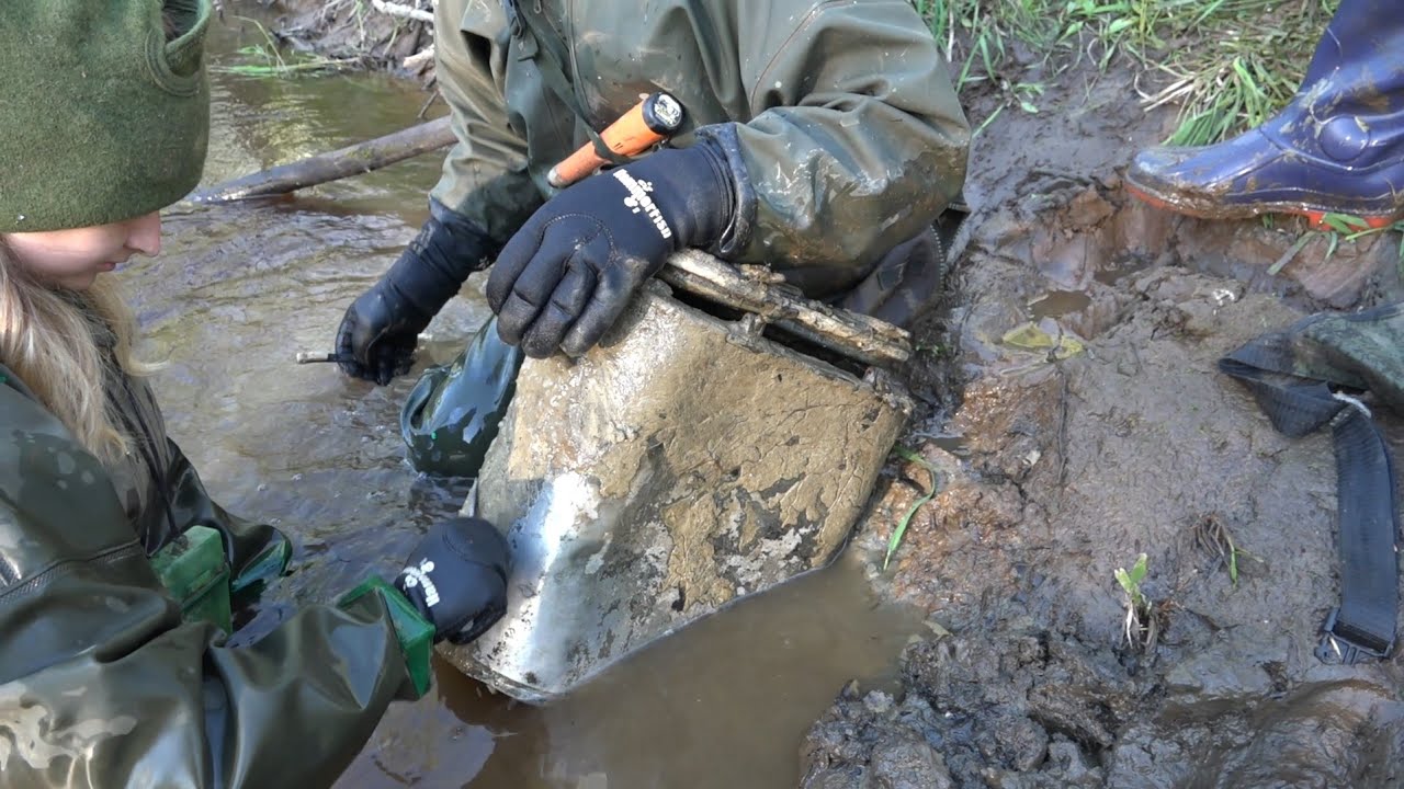 A submachine gun in the hands of a deceased soldier Excavations of