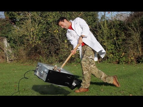 Sledgehammer vs PC in Slow Motion   The Slow Mo Guys