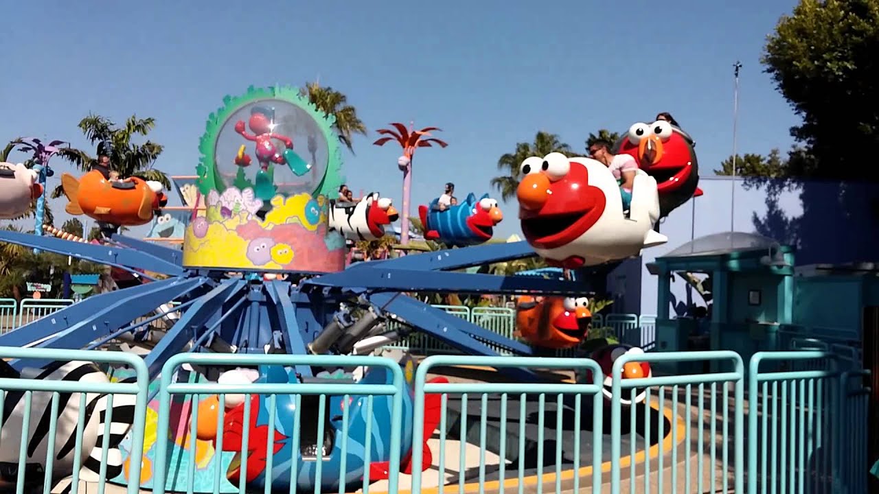 Dylan rides Elmo's Flying Fish with Daddy YouTube
