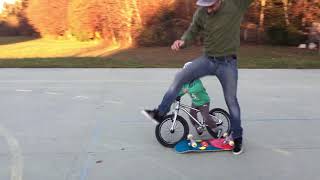 Guy attempts kickflip on skateboard and crashes into his little boy on bike