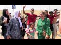 Wild scenes as migrants rush across border into Spanish enclave
