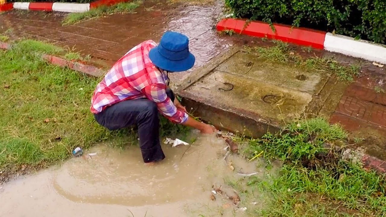 Unclogging Culvert Drain Water On Road Street After Heavy Rain # ...