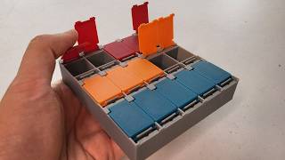 3D Printed Small Components Spring-Tab-Release Organizer Concept (SMD parts box mechanism)