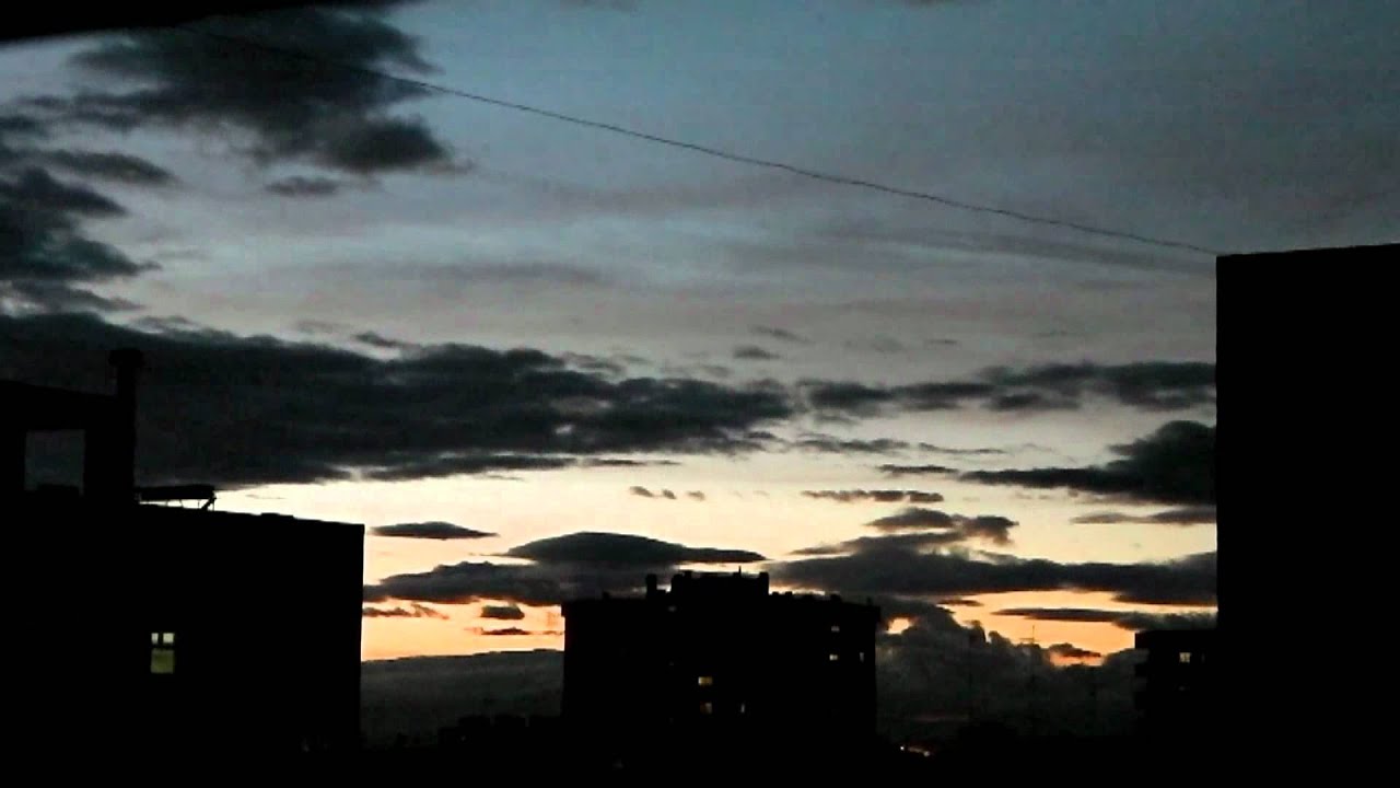 Growin' clouds, setting sun (timelapse HD)