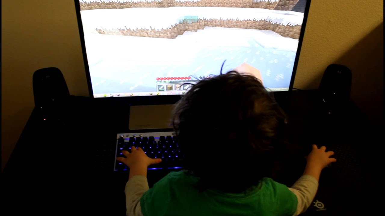 2 year old playing Minecraft on PC