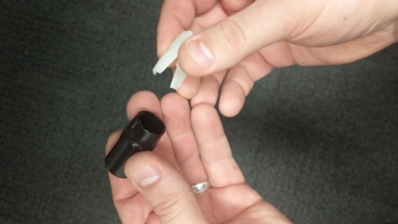 Neutrik ethercon NE8MXR-B-TOP stuck upsidedown and won't come apart.  How to open and take apart?