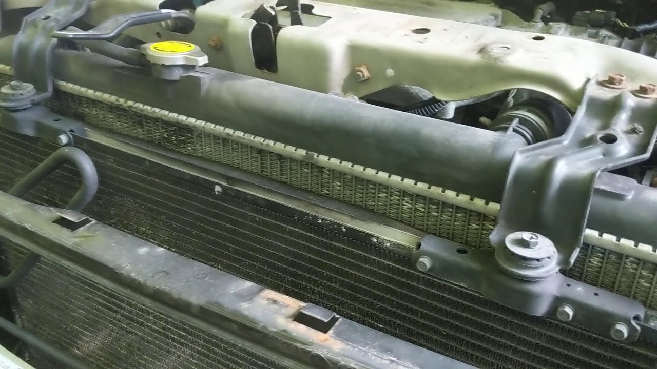 Bypass transmission lines to an extra cooler since radiator nipple