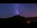 Day to night to day timelapse of the milky way passing over monte padro in corsica