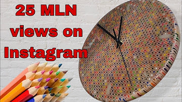 Wall clock made of colored pencils and epoxy