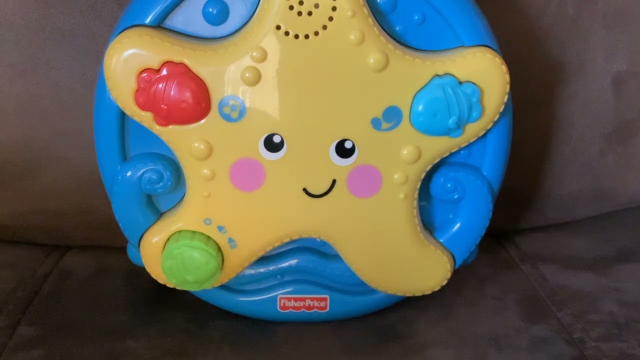 Fisher price ocean wonders take along projection soother song 2