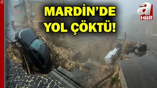 Mardin'de yol çöktü! Park halindeki 2 otomobil çöken yola düştü | A Haber Resimi