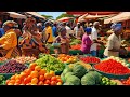 Rural African village market day in Kenya, cooking.