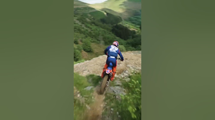 can a motorbike get down the Red Bull Hardline course quicker than a mountain bike?