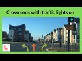 Crossroads with traffic lights on.