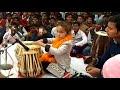 Rudransh playing tabla at college function