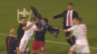 Serbia v Albania football abandoned over drone flag stunt fury(A soccer match between Serbia and Albania was suspended after a drone with the Greater Albanian flag appeared at the stadium. The Albanian PM's brother ..., 2014-10-15T10:22:34.000Z)