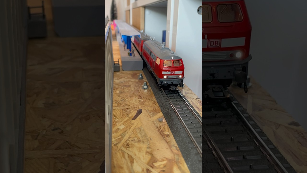 Br 218 mit IC Ankunft und Abfahrt am Bahnhof 