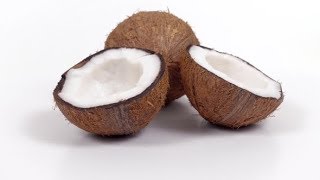 One Whole Coconut and Two Halves with Pulp Rotating on White Isolated Background | Stock Footage -