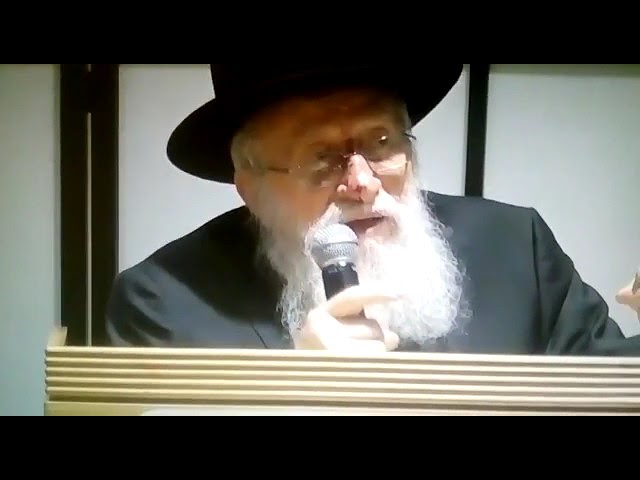 R' Avremel Korf campigning to publisize that the Rebbe is a Novi