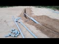 Electrical service trench complete with conduit installed and depth measured for count inspection