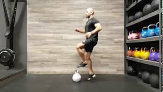 Kettlebell toe tap