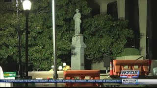 Crews remove the Confederate monument outside Madison County courthouse