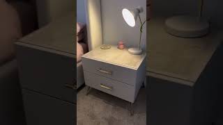 This sleek hinged wardrobe is a masterclass in modern design