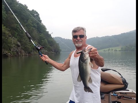 BASS FISHING at SMITH MOUNTAIN LAKE! TOP-WATER ACTION!