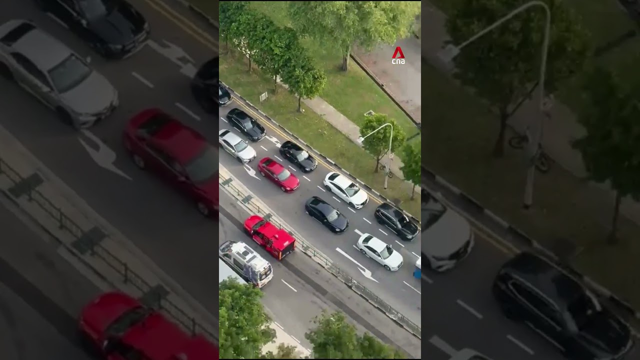 Sinkhole appears at Tanjong Katong Road South, vehicle partially submerged