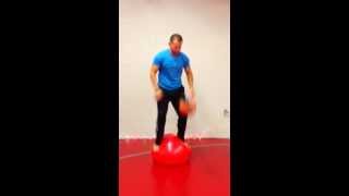 Medicine Ball Slams Balancing On A Stability Ball - Beyond Fitness