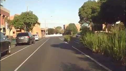 Dash cam video, guy runs through a red light in front of me. (language warning)