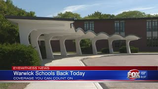 Warwick schools return after dispute over budget cuts