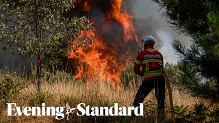 Hundreds of firefighters sent to tackle wildfires in Portugal as temperatures soar