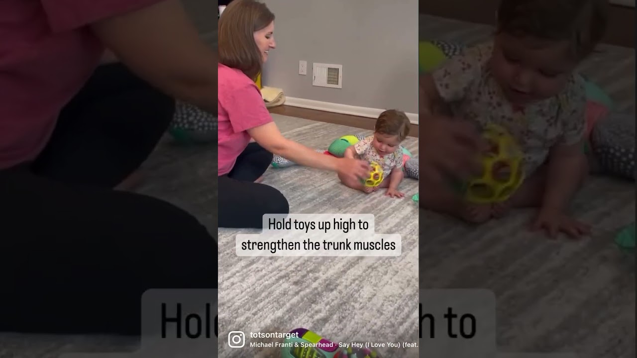 Help Your Baby Sit Upright: Toy Lifting Tip for Better Posture!