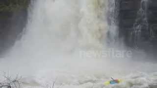 Kayaking over Brownville waterfall