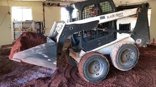 CRAZY BOBCAT SKIDSTEER skills INSIDE A HOUSE!