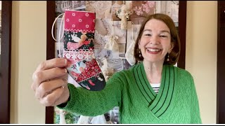 Wintertale Patchwork Christmas Stocking Ornament
This patchwork stocking features the Wintertale Fabric Collection by Katarina Roccella for Art Gallery Fabric.
You Can Make This!
Supply List:
Wintertale Fabrics,
#50 Pellon non-fusible Interfacing,
1/16-inch satin ribbon,
Flat lace or trim of your choice,
Scissors, Sewing machine with decorative stitches,
Iron, Ironing surface,
Clear ruler, fabric markers Wintertale Patchwork Christmas Stocking Ornament