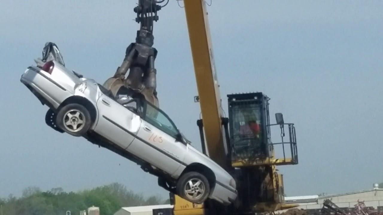 crushed car action YouTube