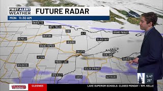 Mild and breezy on Monday with light snow possible Tuesday