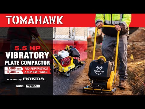 Plate compactor in action