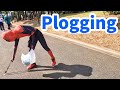 Spiderman picking up trash