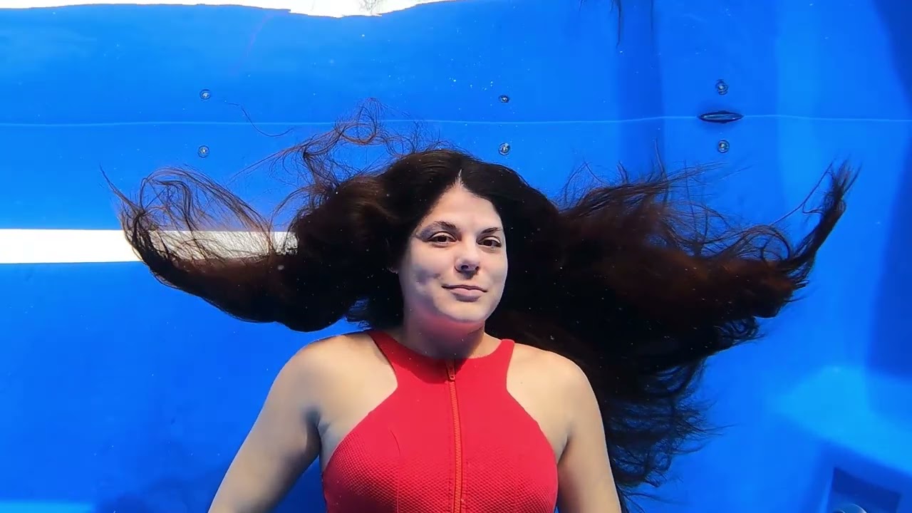 Peaceful underwater sitting with graceful floating long hair, NO TALKING 