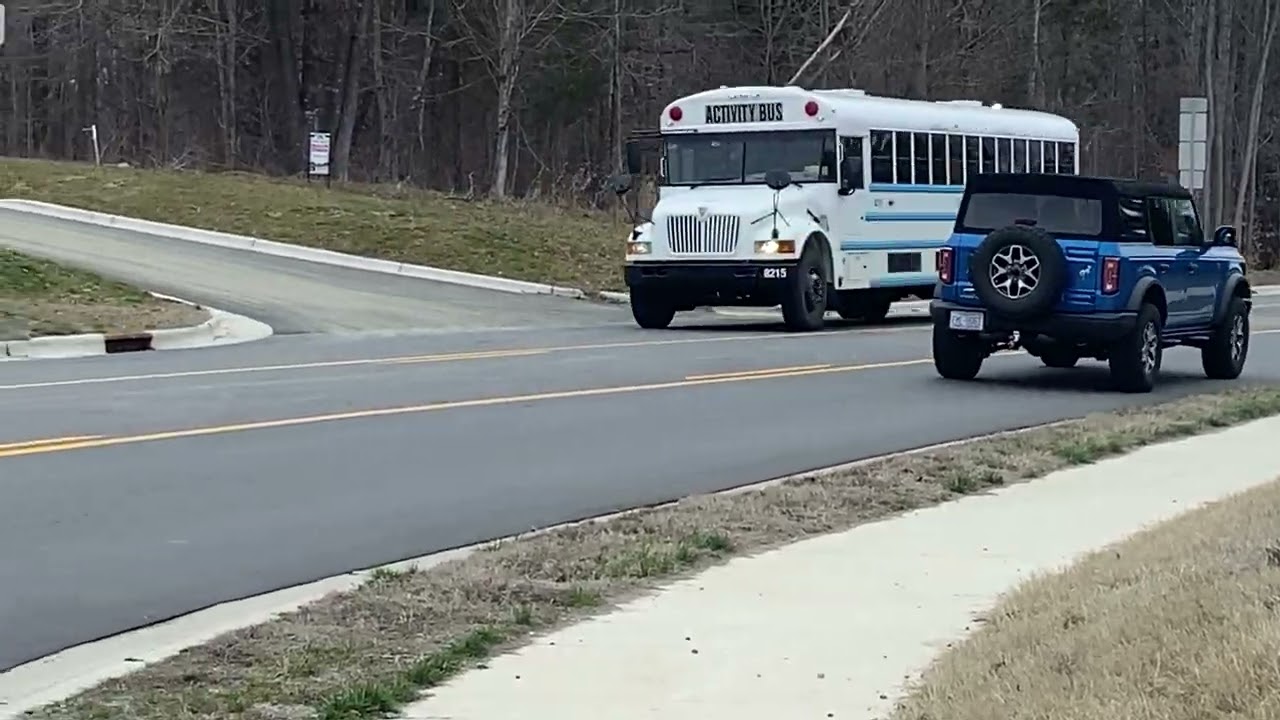 Bus 8215 driving by and then coming back around