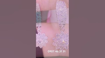 Bông tai xoàn tòn ten,hoa cúc.HK ý 750 gồm 2viên 3li6 D Vvs1 GIA ,24 viên 2 li2 64 viên 1 li2-1li8.