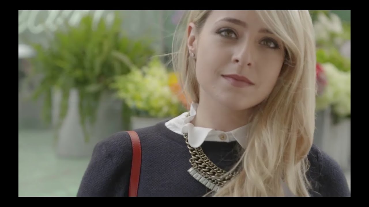 Fleur De Force with her Strathberry Midi Tote in Ruby