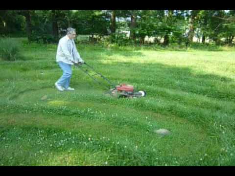 mowing a grass chartres labyrinth at Waycross