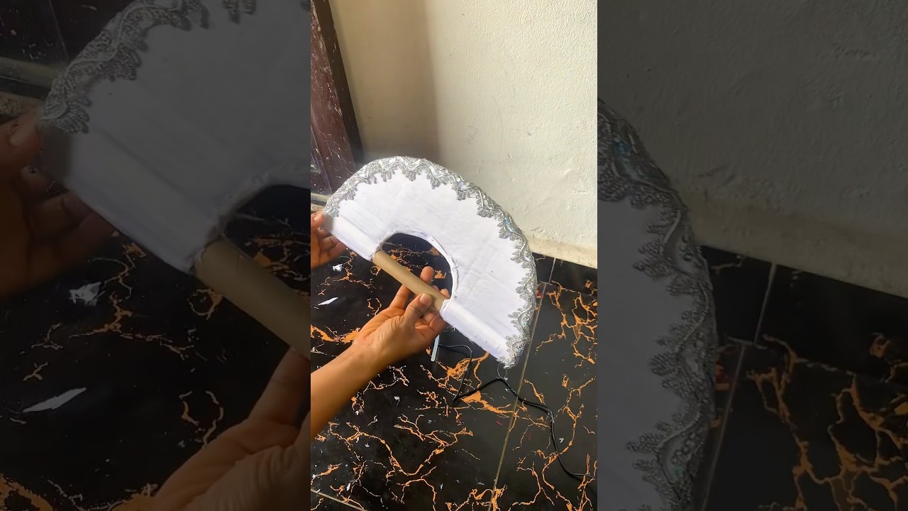 Mummy makes the most beautiful bridal handfan 