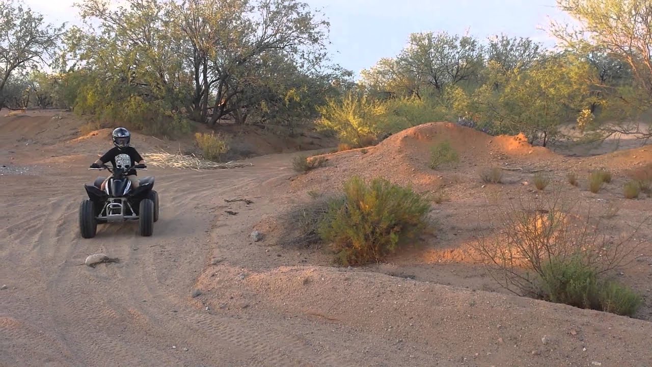 Kids riding quads in the desert YouTube